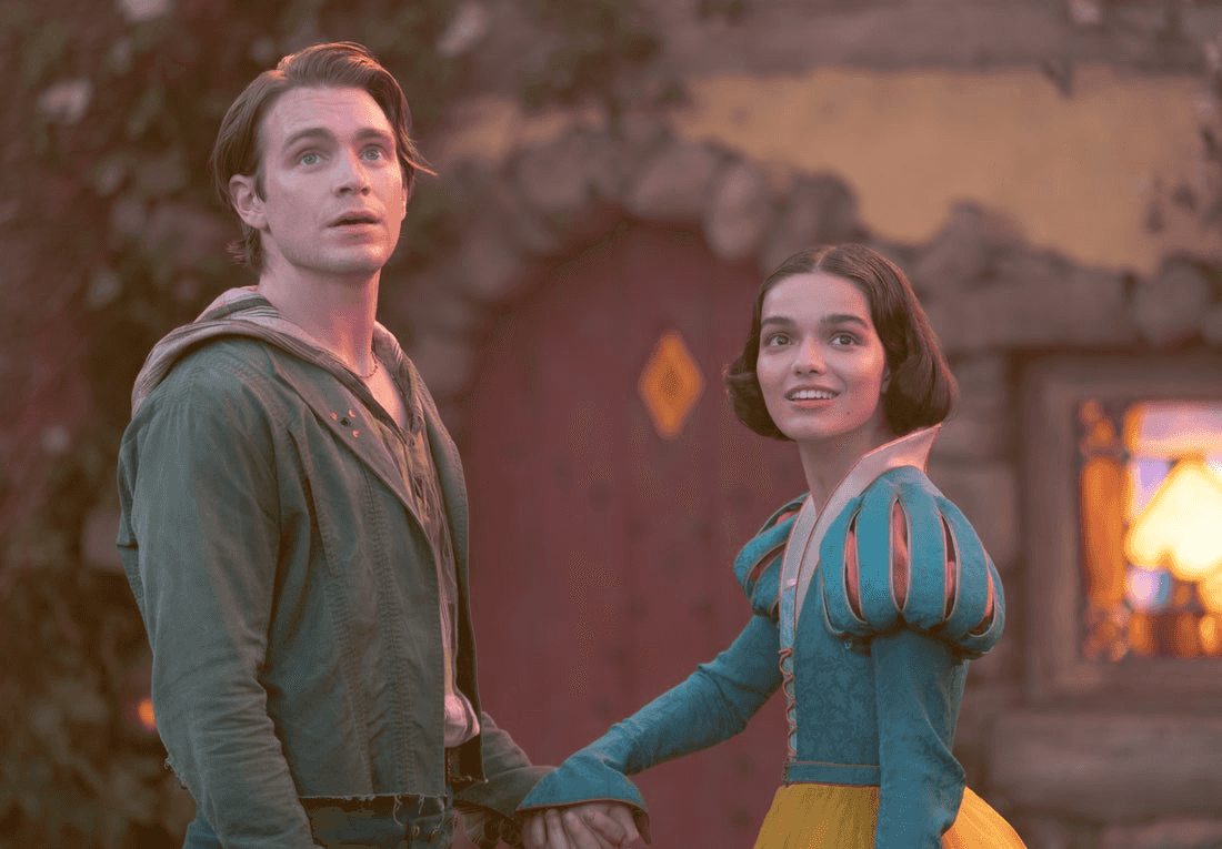 (L-R) Jonathan (Andrew Burnap) and Snow White (Rachel Zegler) in Disney's live-action SNOW WHITE. Photo by Giles Keyte. © 2024 Disney Enterprises, Inc. All Rights Reserved.
