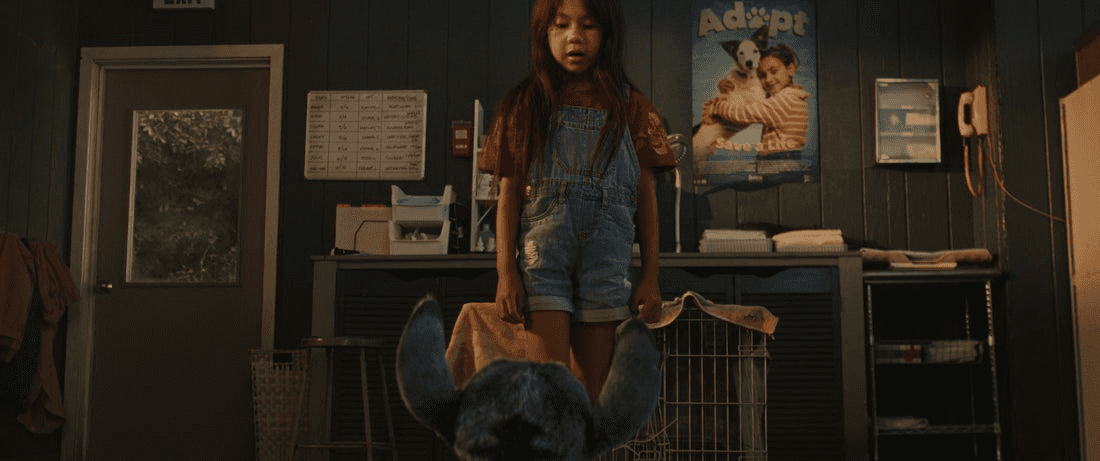 (L-R) Stitch and Maia Kealoha as Lilo in Disney’s live-action LILO & STITCH. Photo courtesy of Disney. © 2024 Disney Enterprises Inc. All Rights Reserved.